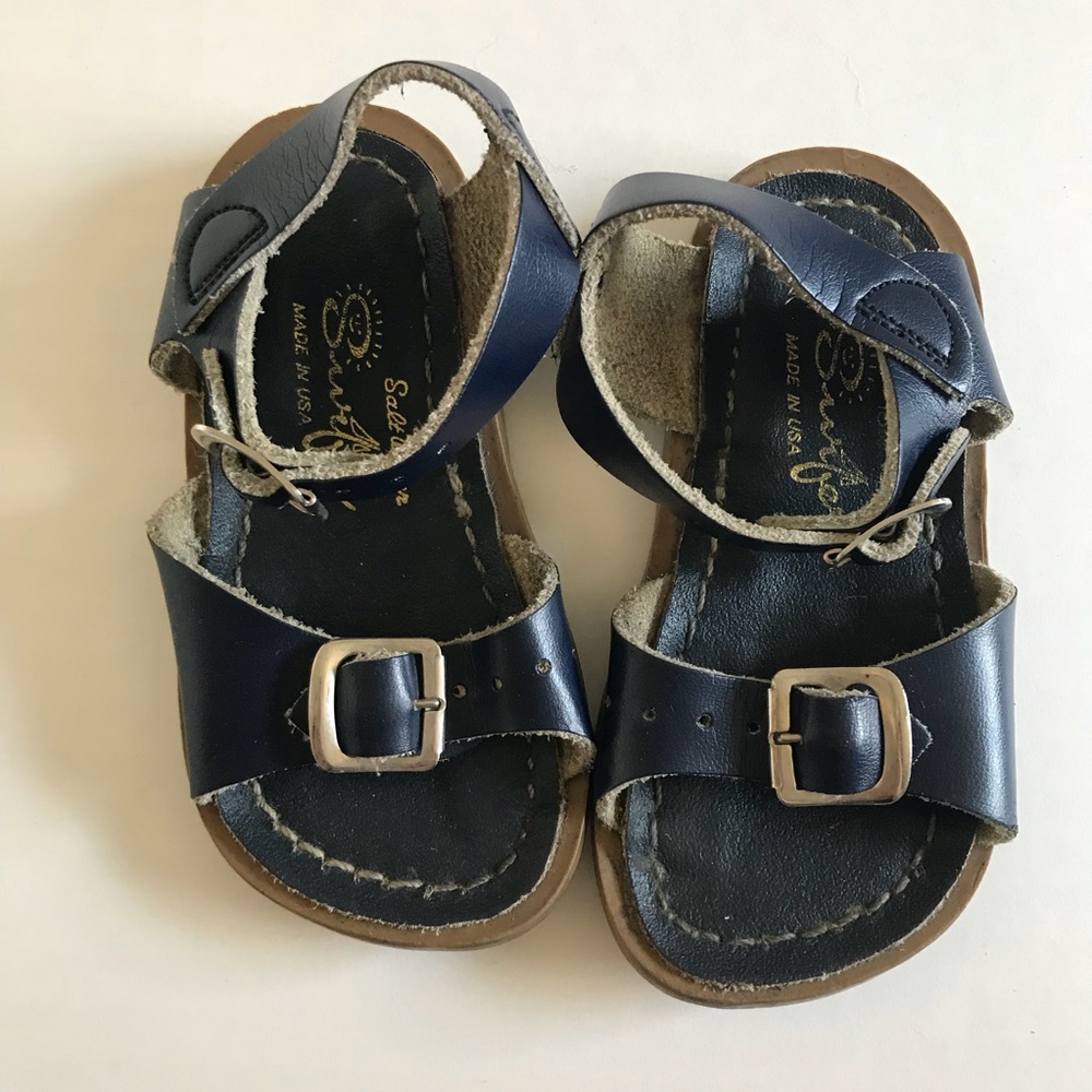 Navy salt water sandals surfer